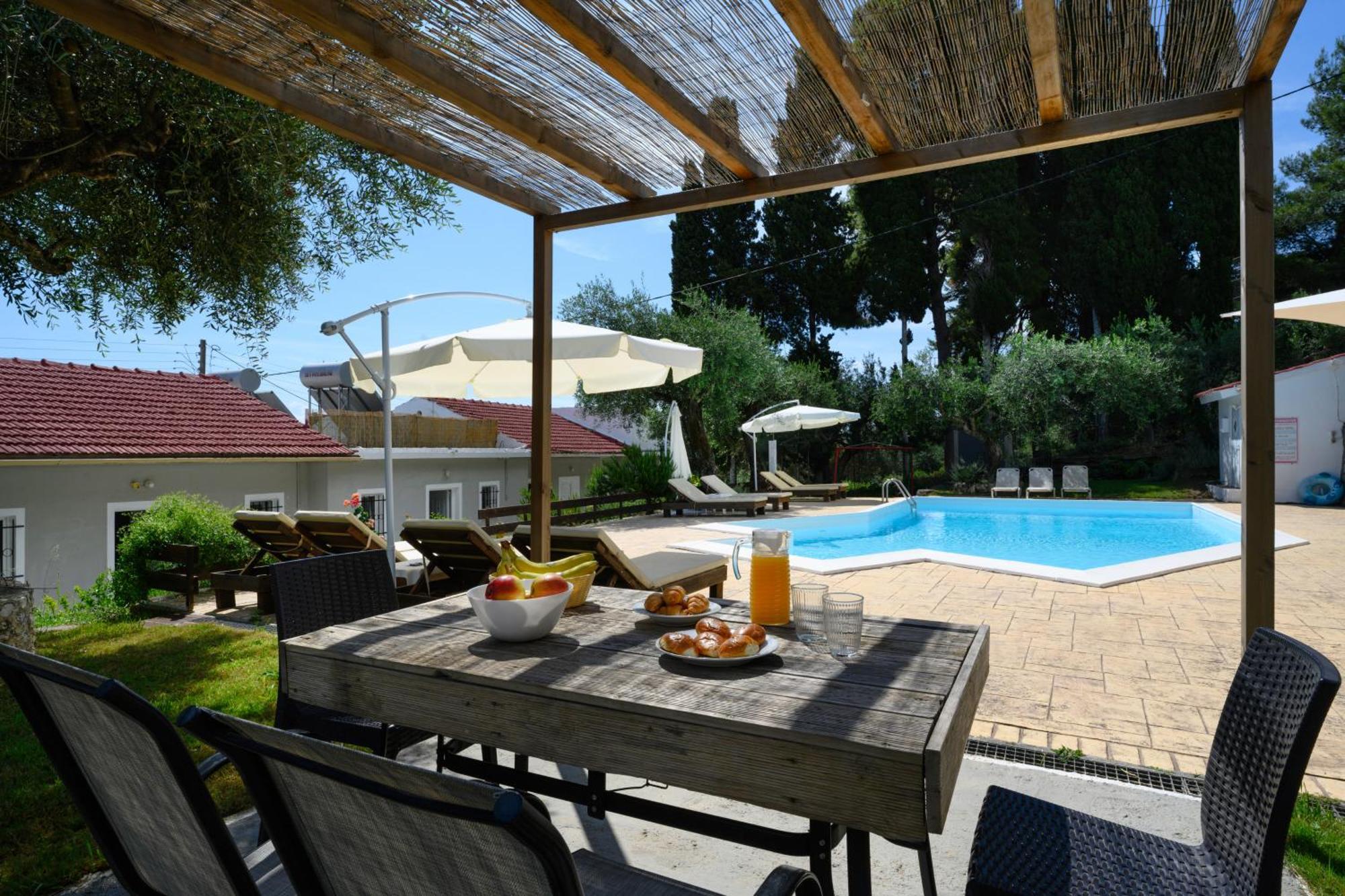 Olive Grove Poolside Apartments Benitses  Bagian luar foto